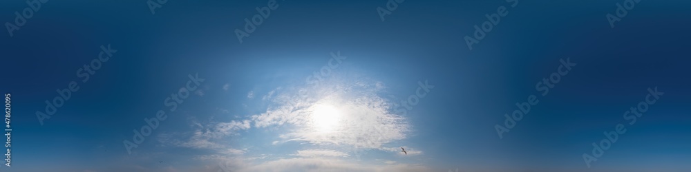 Obraz premium Blue sky panorama with Cirrus clouds in Seamless spherical equirectangular format. Full zenith for use in 3D graphics, game and editing aerial drone 360 degree panoramas for sky replacement.