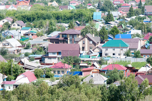 Several residential buildings in the Russian village in the summer