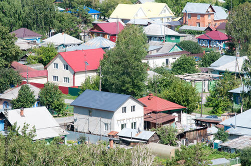 Several residential buildings in the Russian village in the summer