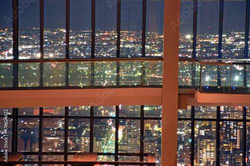 Night view over windows of observation room of Sky Promenade in Nagoya City, Japan