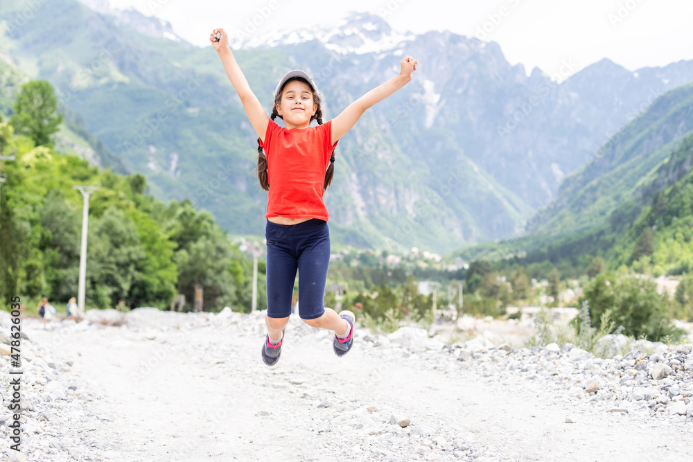 portrait of a girl against the panorama of the Alps portrait of a girl against the panorama of the Alps