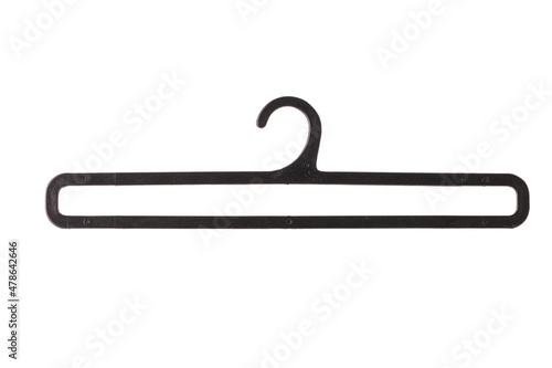 Black plastic hanger for clothes isolated on white background..