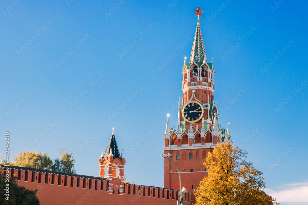 Kremlin wall and Spasskaya tower in autumn afternoon