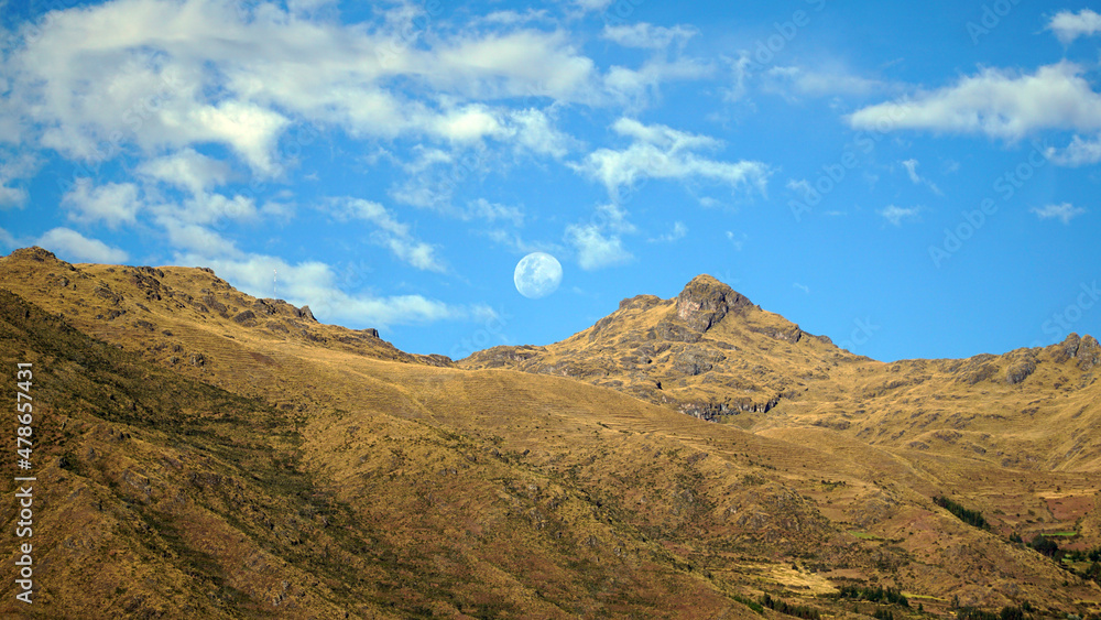 golden hills landscape blue sky and moon