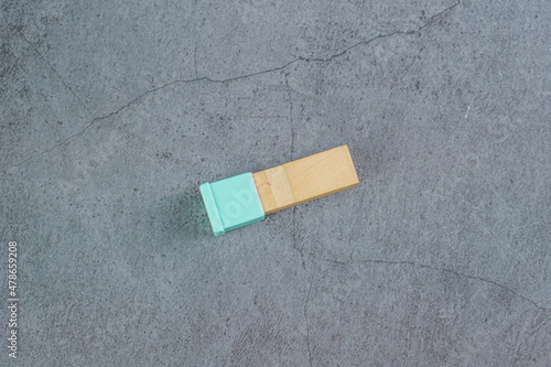 Wood seal with green cap isolated on grey background 