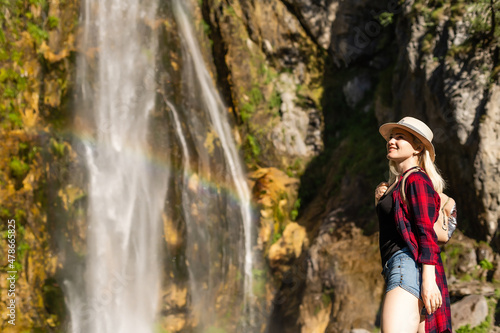 Theth, Albania, Europe. Tourists visiting the beautiful Albanian mountain waterfall