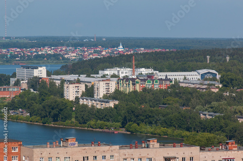 view of city rooftops in summer