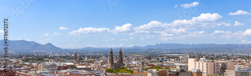Central Mexico, Aguascalientes. Panoramic view of colorful streets and colonial houses in historic city center near Cathedral Basilica, one of the main city tourist attractions. photo