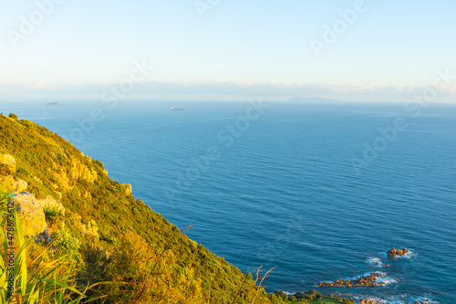 View to horizon with slope on summit of Mount maunganui.