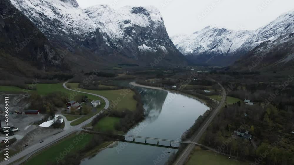 Trollveggen Mountain Massif In Snow With Rauma River In Foreground. Andalsnes, Norway. aerial Trollveggen Mountain Massif In Snow With Rauma River In Foreground. Andalsnes, Norway. aerial