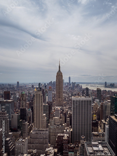 The Empire State building viewed from the Rockefeller Centre on a sunny day in New York City