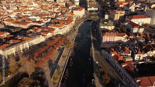 Aerial view of Aveiro canal in the center of the little town in Portugal during golden hours sunset