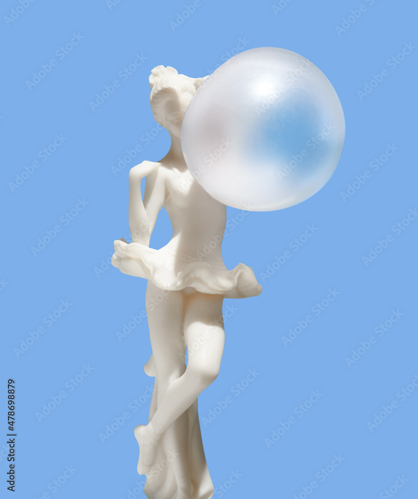 Obraz premium Statuette of ballerina and inflated bubble gum ball. Art, aesthetics, creative mood.