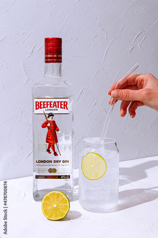 Minsk, Belarus - 04-01-2022: making gin and tonic cocktail with ...