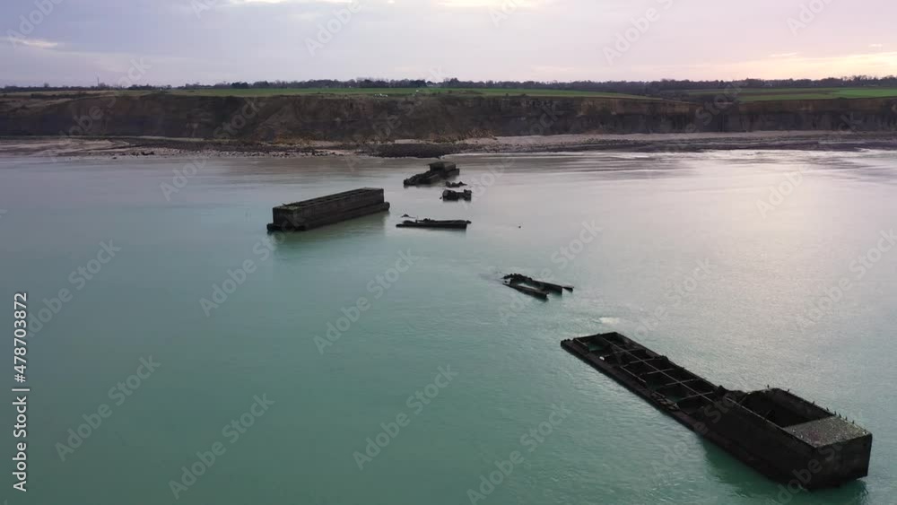traces of the artificial harbour in Arromanches during world war II traces of the artificial harbour in Arromanches during world war II