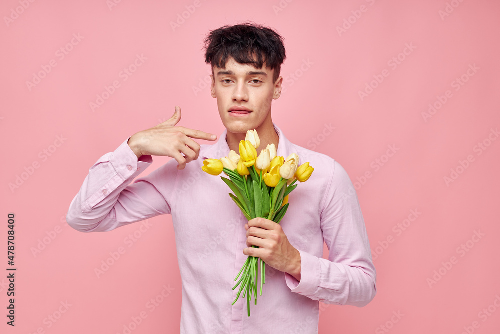 pretty man bouquet of flowers date romance posing isolated background unaltered pretty man bouquet of flowers date romance posing isolated background unaltered