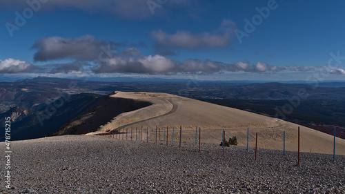 View of the bare top of Mont Ventoux, popular for cycling and skiing, with white limestone rocks in Provence region, France with panoramic view.