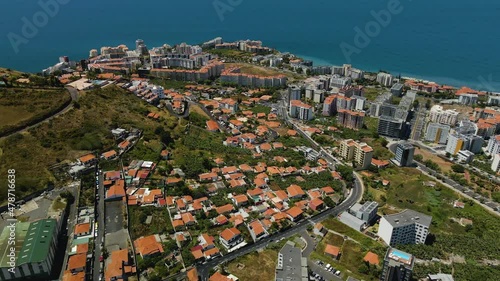 View on the Buildings in Sao Martinho, Madeira Island, Portugal - aerial drone shot photo