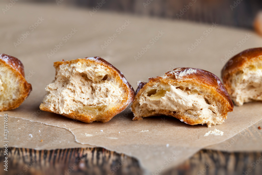 small cakes with custard dough and milk filling