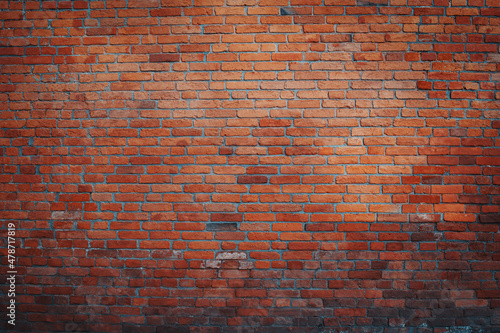 Texture of old dark brown and red brick wall . Grunge construction texture . Panoramic view
