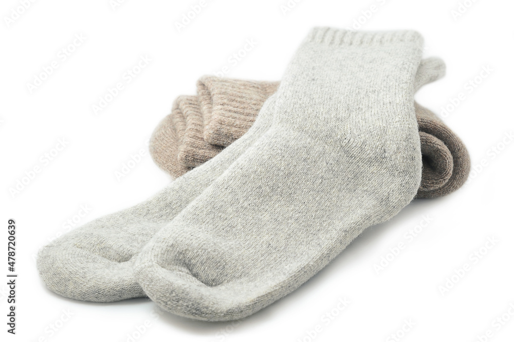 grey sheep wool socks isolated on a white background grey sheep wool socks isolated on a white background