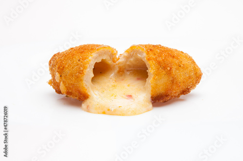 Chicken ala Kiev small with cheese and diced vegetables. Isolated on a white background. photo