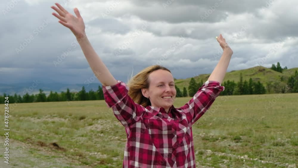 Happy girl rejoices at success. A young girl is jumping with happiness. The concept of winning, winning the lottery, freedom. Happy girl rejoices at success. A young girl is jumping with happiness. The concept of winning, winning the lottery, freedom.