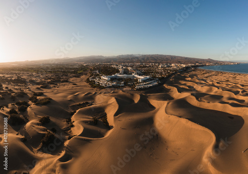 Maspalomas town amidst sand dunes at sunset, Grand Canary, Canary Islands, Spain photo