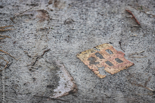 old yellow brick pressed in ground