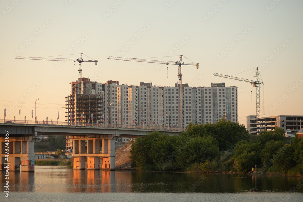 Kazan, Russia - June 8, 2021: Construction crane and a building house