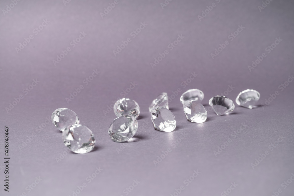 Diamonds out of Glas on a grey Background Diamonds out of Glas on a grey Background