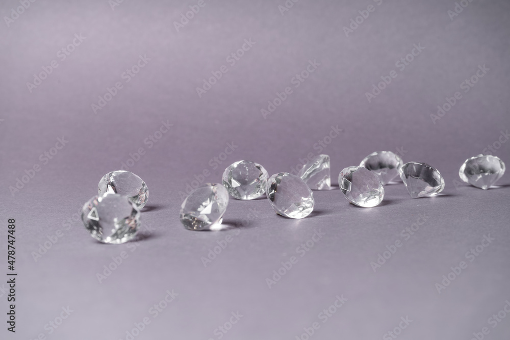 Diamonds out of Glas on a grey Background Diamonds out of Glas on a grey Background