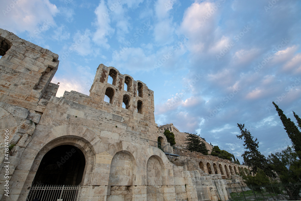 Evening sky with clouds against the background of the ruins of ancient greek architecture