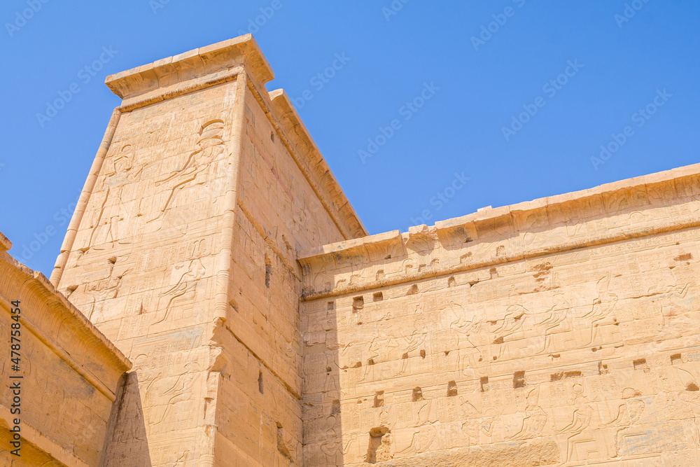views of philae temple, full of hieroglyphics in aswan city.	