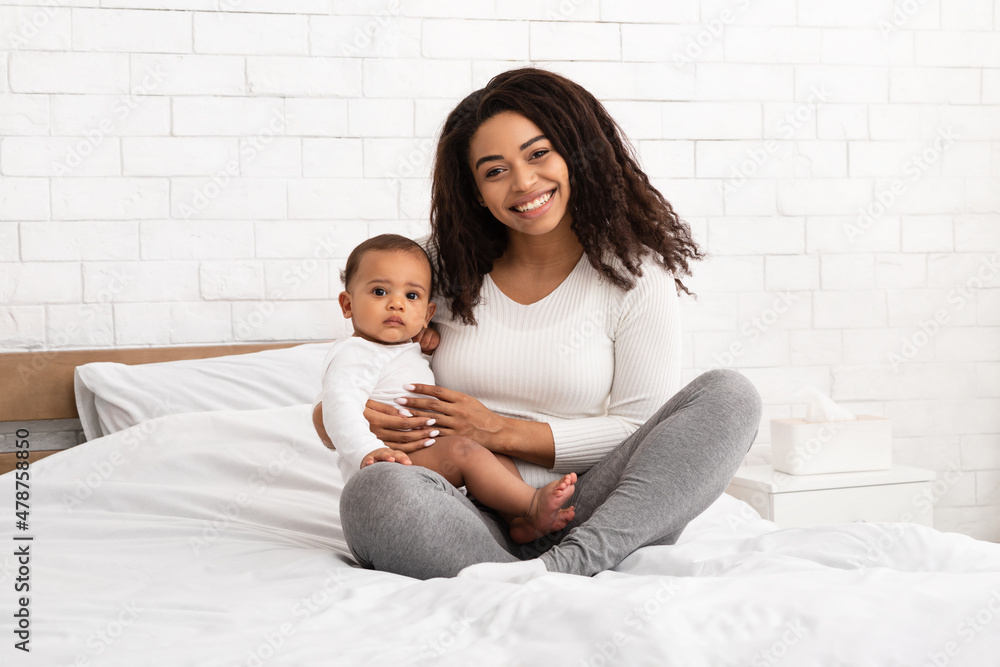 Happy African American Mother Hugging Holding Infant Baby Boy Indoor Happy African American Mother Hugging Holding Infant Baby Boy Indoor