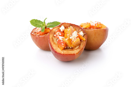 Stuffed baked apples isolated on white background