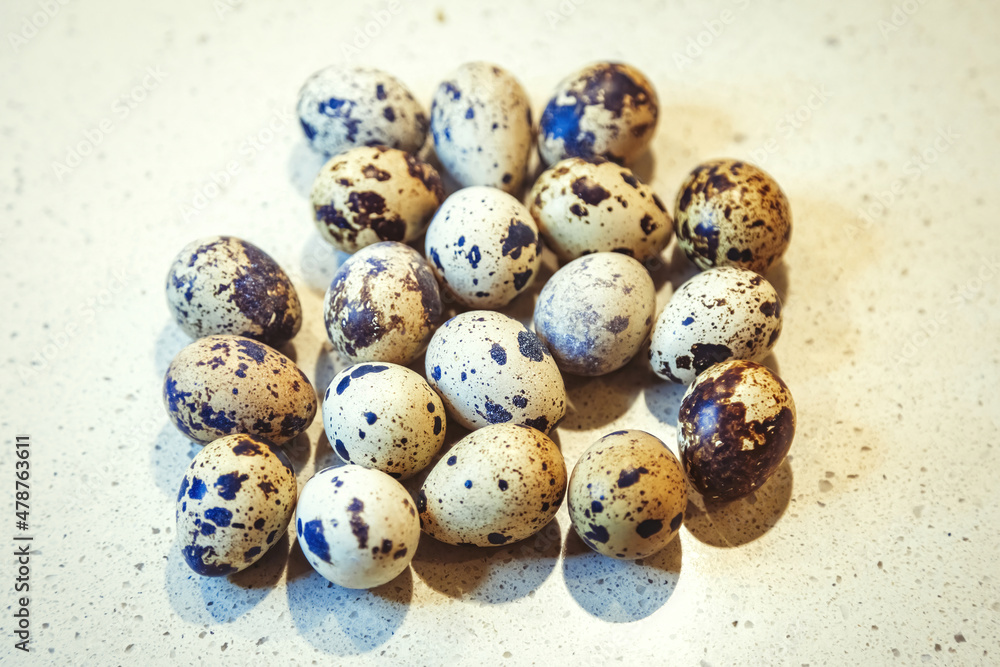Fresh quail eggs. Dietary natural product in a thin spotted shell Fresh quail eggs. Dietary natural product in a thin spotted shell