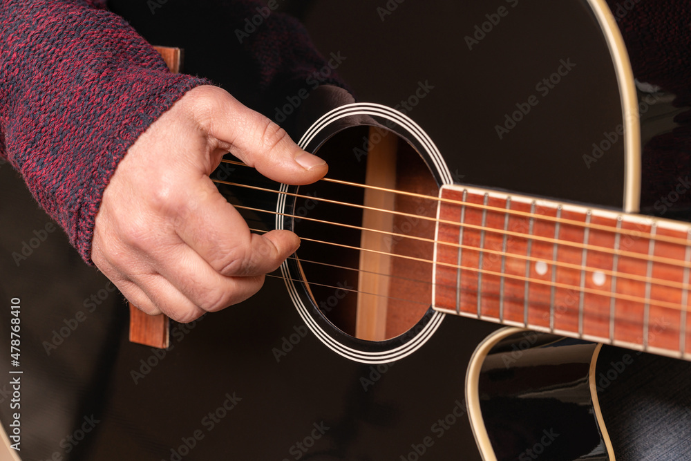 Fototapeta premium man playing guitar
