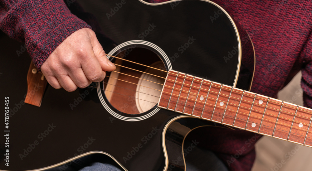 Fototapeta premium man playing guitar