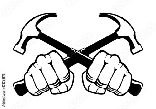 Hand holding crossed hammer