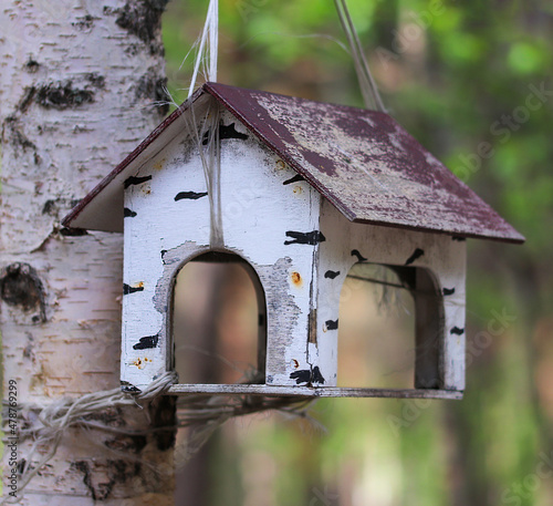 Birdhouse on a tree in the park