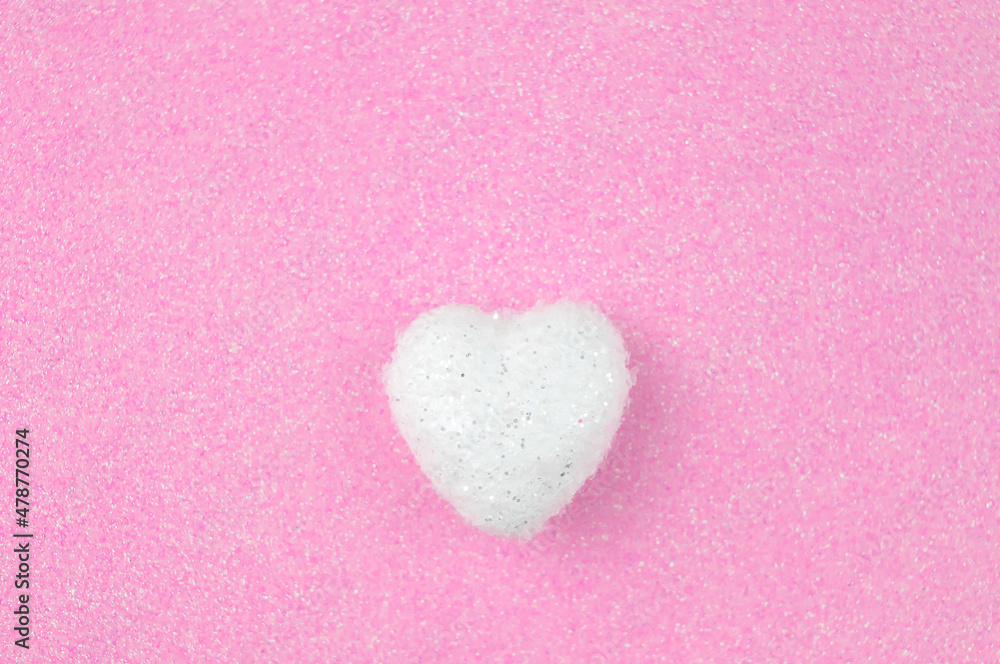 Obraz premium White heart on pink background love concept 