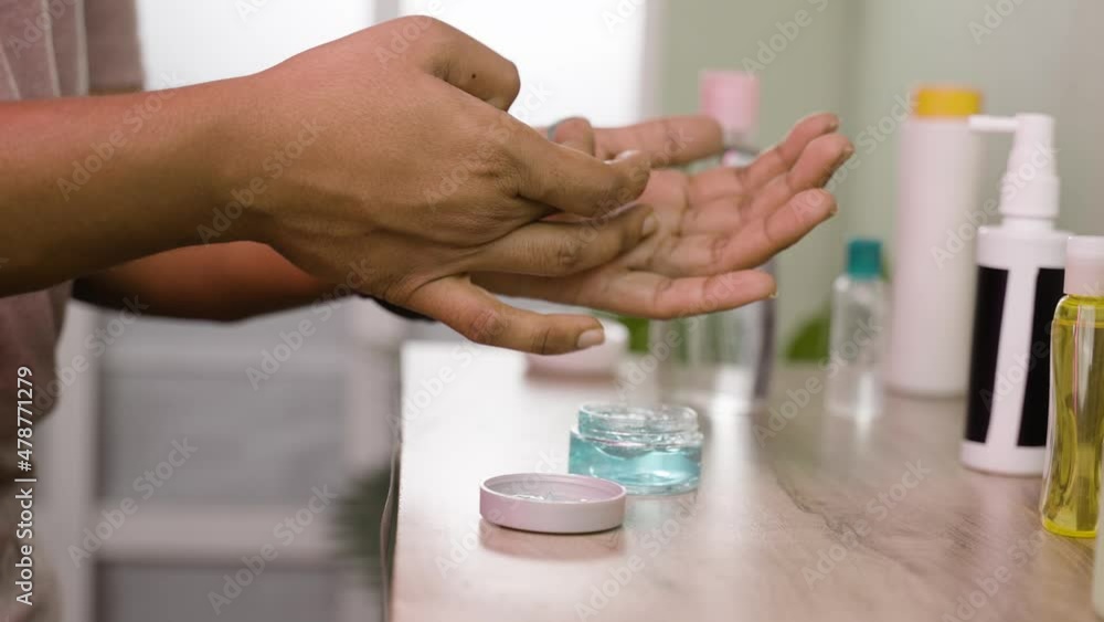 close up shot of taking cold or moisturizing cream for applying - concept of skincare protection, wellnesss and cosmetics close up shot of taking cold or moisturizing cream for applying - concept of skincare protection, wellnesss and cosmetics