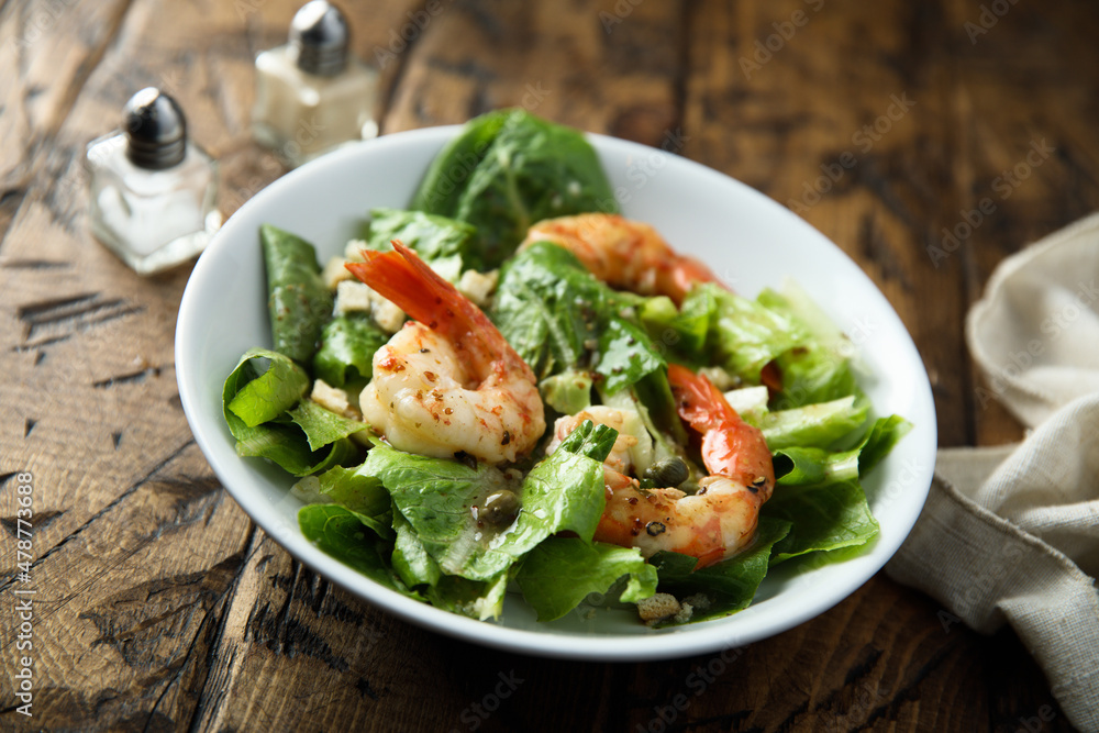 Homemade Caesar salad with shrimps Homemade Caesar salad with shrimps
