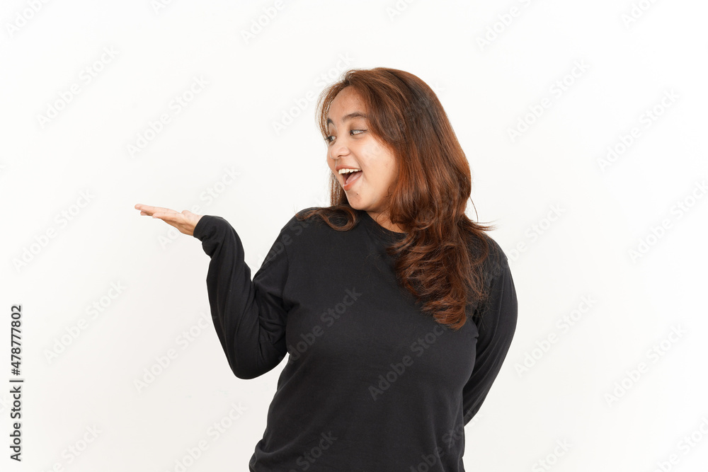Showing recommended product on open palm Of Beautiful Asian Woman Wearing Black Shirt Showing recommended product on open palm Of Beautiful Asian Woman Wearing Black Shirt