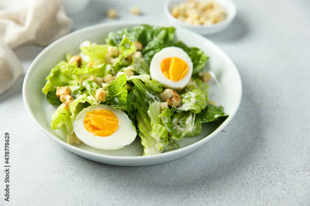 Healthy green salad with cashew and hard boiled eggs Healthy green salad with cashew and hard boiled eggs