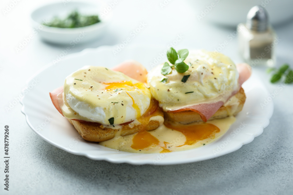 Traditional homemade Benedict eggs with ham Traditional homemade Benedict eggs with ham