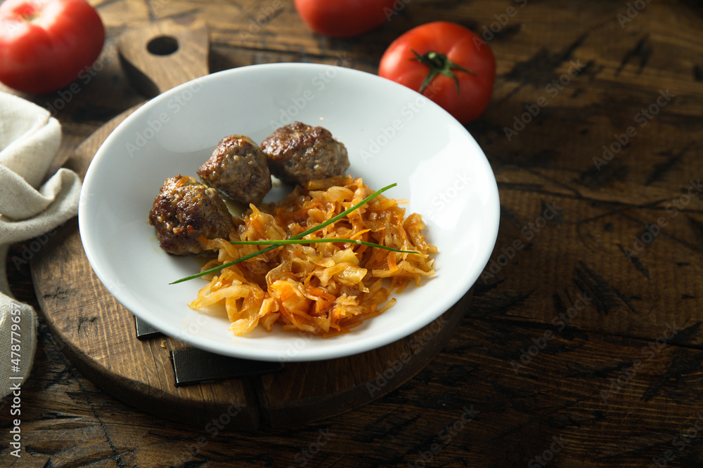 Homemade meatballs with cabbage and tomato Homemade meatballs with cabbage and tomato