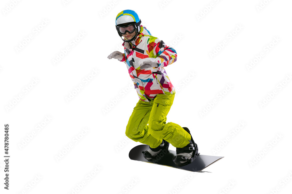 Obraz premium Portrait of young woman in bright sportswear, goggles and helmet snowboarding isolated on white studio background. Concept of winter sports