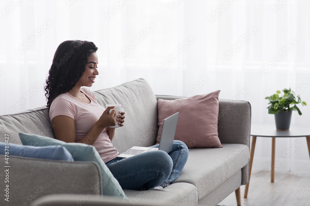 Relax with favorite drink and social networks, creating idea for work online, enjoy tasty tea Relax with favorite drink and social networks, creating idea for work online, enjoy tasty tea